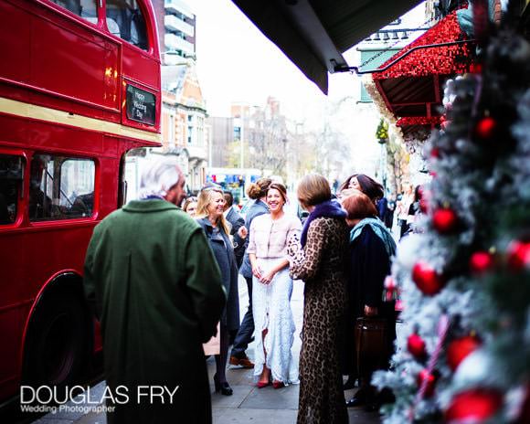 Wedding Photographer Marylebone Town Hall and the Ivy 7 Bride with Christmas trees and bus in front of the Ivy Chelsea