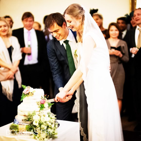 Cutting of the cake at London wedding