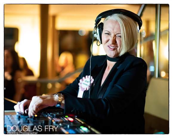 Friend at wedding as DJ