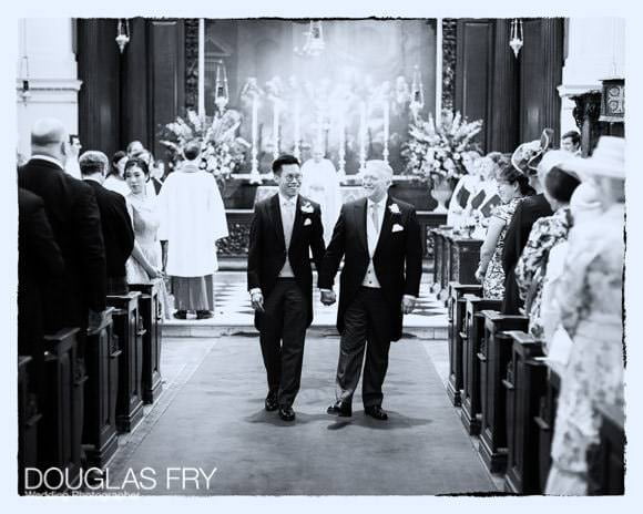 Couple leaving church hand in hand - Central London church