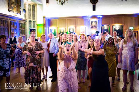 Photography of Bride Throwing Her Wedding Bouquet at Gray's Inn in London! 5