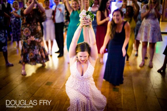 Photography of Bride Throwing Her Wedding Bouquet at Gray's Inn in London! 6