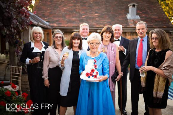 80th Birthday cake and guests