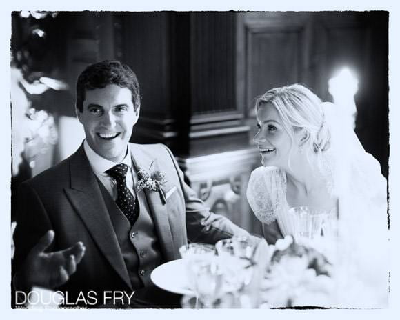 Black and white photograph of couple at dinner