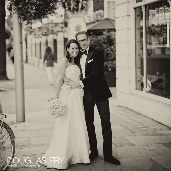 Chelsea street with Bride and groom pictured in black and white