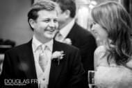 Bride and groom pictured in black and white