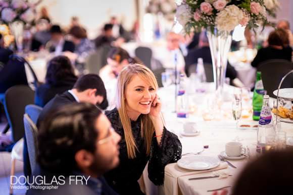 Guests at wedding celebration in London synagogue