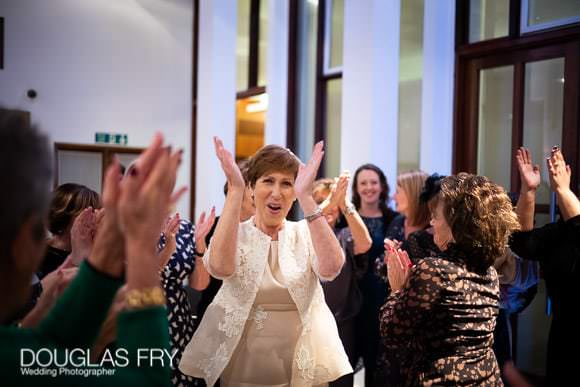 Wedding St John's Wood Synagogue - bride enjoying the day