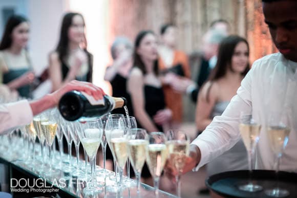 Champagne being served at the Bluebird during a Birthday party