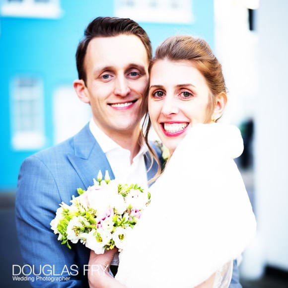 couple photographed in Chelsea streets as romantic wedding photographs