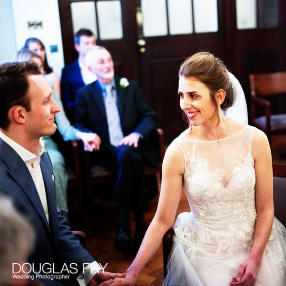Bride and groom during wedding ceremony at Chelsea Register Office