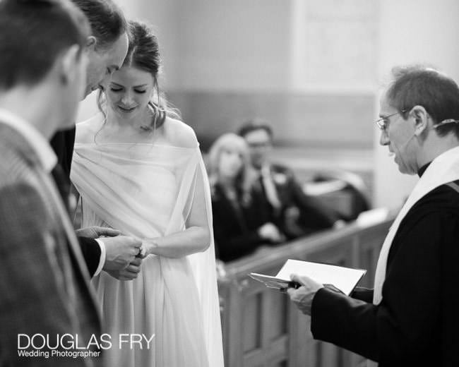 Couple exchanging vows in London church