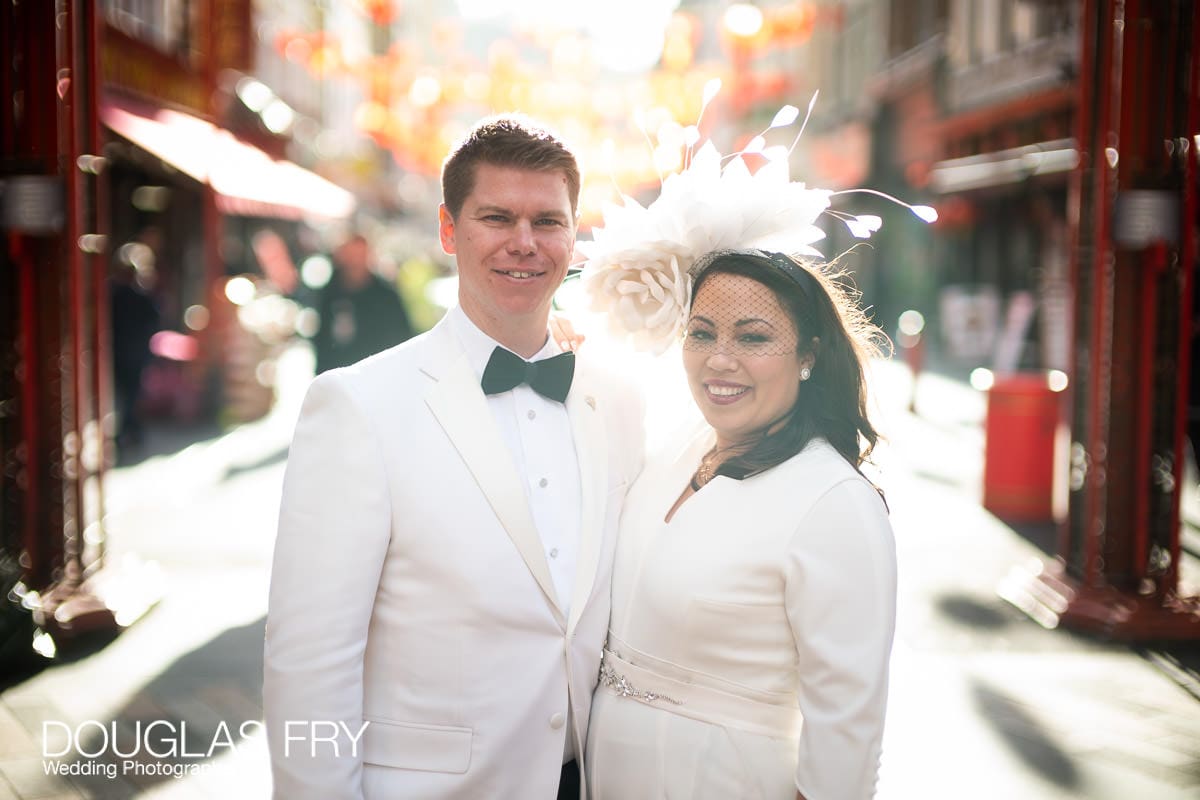 Portrait of wedding couple in Chinatown - London