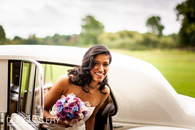 Bride arriving at syon park in rolls royce