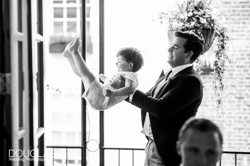 child at reception of wedding in London