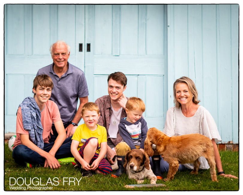 Group photograph of family together at home in Berkshire