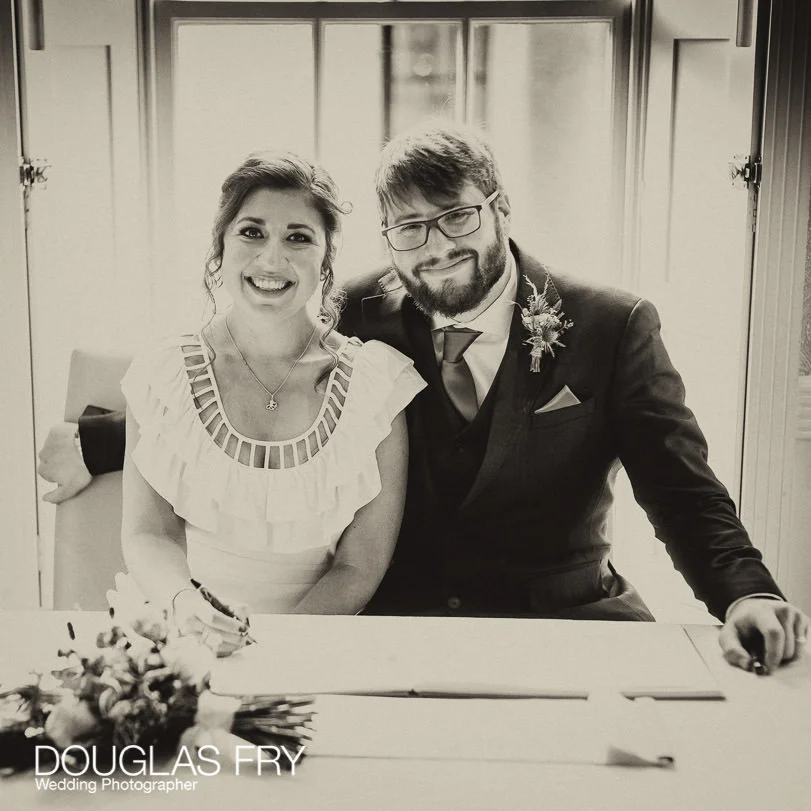Socially Distanced Wedding Photography in London at Frederick's 6 Socially Distanced Wedding Photography signing register in London