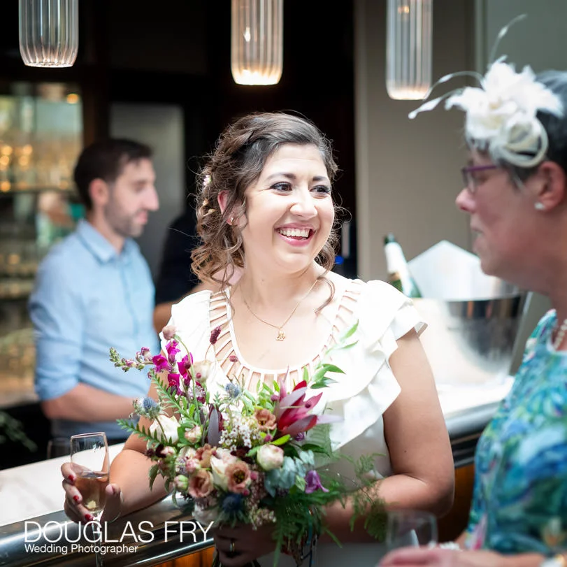 Socially Distanced Wedding Photography in London at Frederick's 9 Bride enjoying wedding reception at Socially Distanced Wedding in London