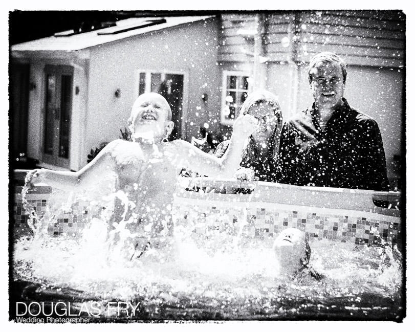 Children playing in swimming pool during photo shoot