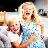 Children photographed at home in London playing together