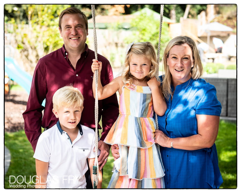 FAmily photographed together in garden