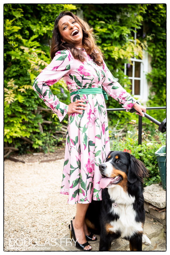 Mother and dog photographed outside house