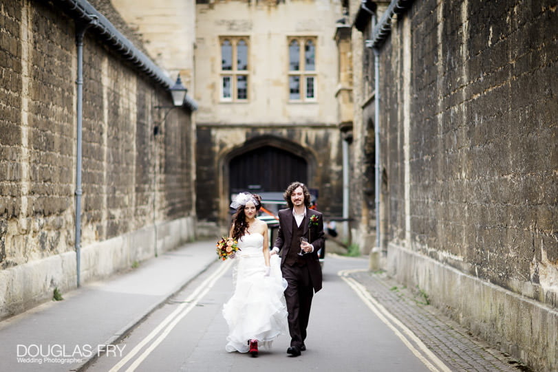 Micro wedding - photography of couple walking through the centre of Oxford