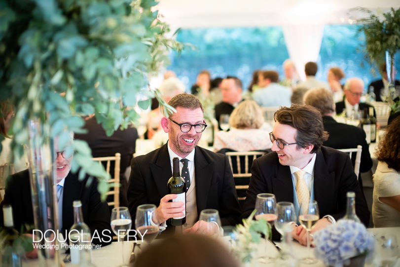 guests at country wedding photographed with Leica Noctilux Lens in low light