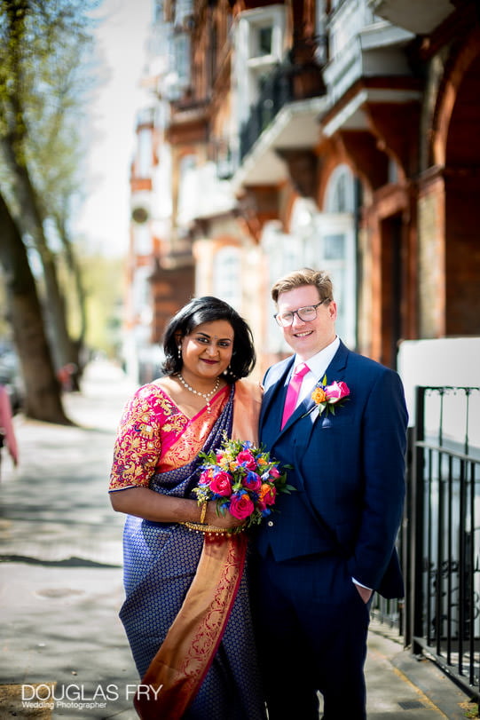 Bride and groom photographed together in London