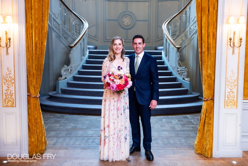 Formal photograph of bride and groom in London afer wedding