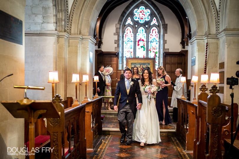 bride and groom leaving surrey church