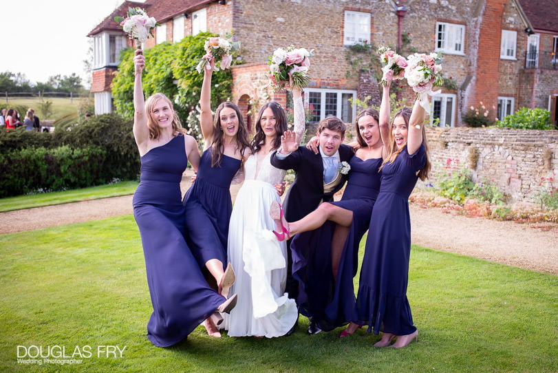 country wedding photographer - bride with bridesmaids and bouquets