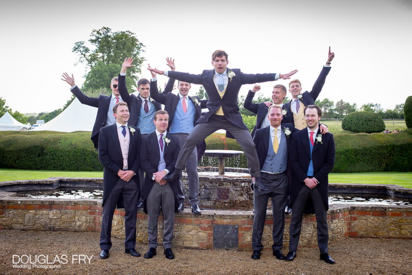 Groom photographed with best men in Surrey