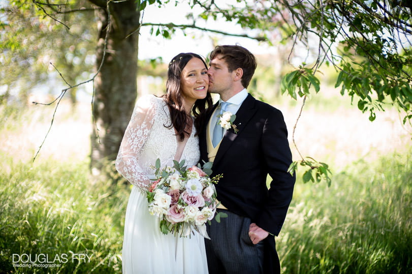 Wedding photographer - couple photograped in countryside