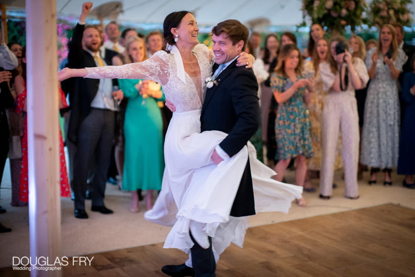 couple on dance floor in marquee