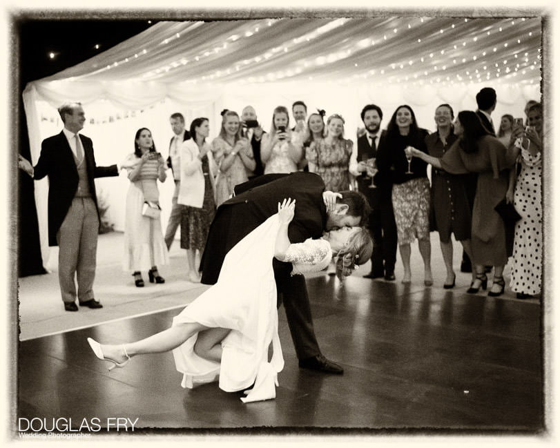 wedding photographer - couple dancing in marquee - countryside wedding