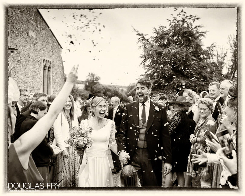 wedding photographer Marlborough - couple with confetti