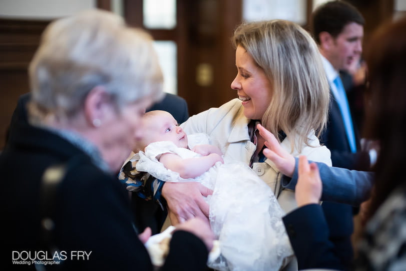 Baptism photographer at Farm Street Church in London - guests