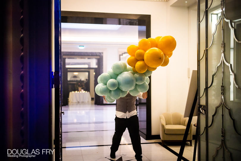 Wedding Photographer - balloons at Claridge's Hotel in London - St Georges Hannover Square