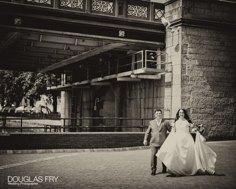 Douglas Fry Wedding Photographer - Tower Bridge Wedding - couple walking