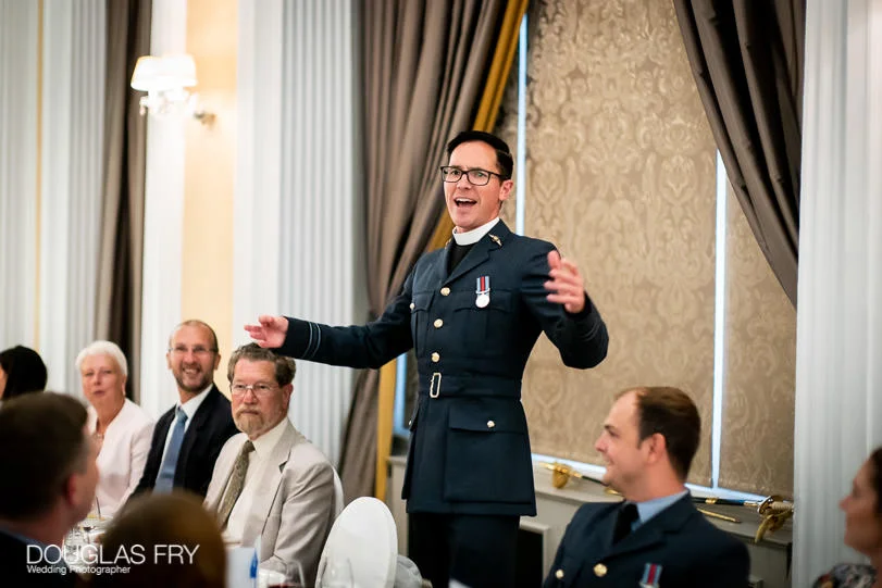 Military Wedding Photographer at St Clements Dane Church and The RAF Club in London 12 padre - wedding photographer RAF Club in London