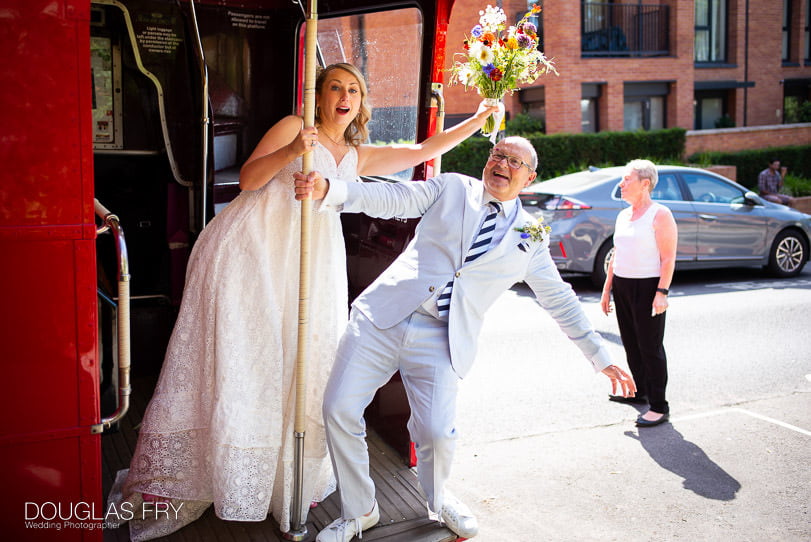 Bride and groom wedding photograph on London routemaster bus