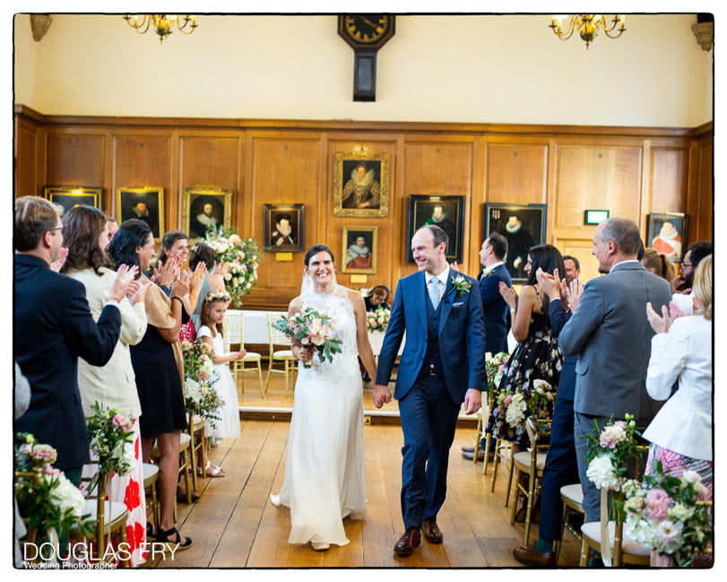 Bride and groom photographed at Gray's Inn in London after the ceremony