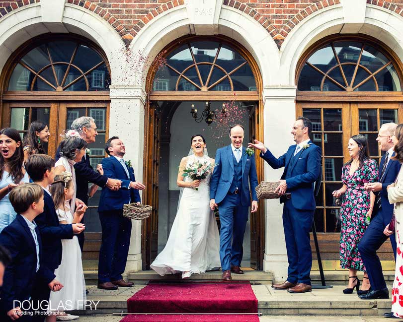 Bride and groom photographed at Gray's Inn in London - confetti photograph