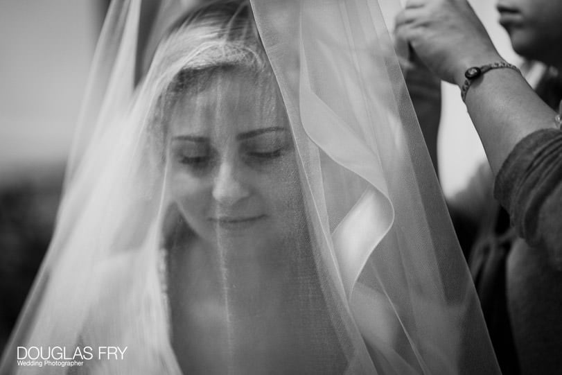 Wedding photographer at Mandarin Oriental - bride wearing veil