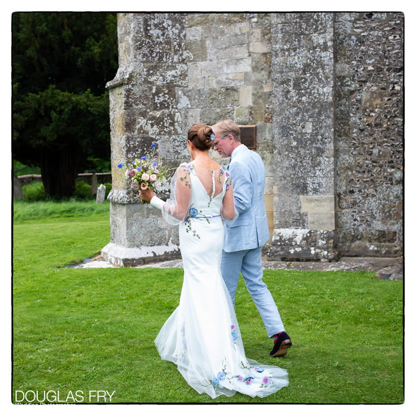 Wedding photography - Hampshire photographer - bride and groom walking