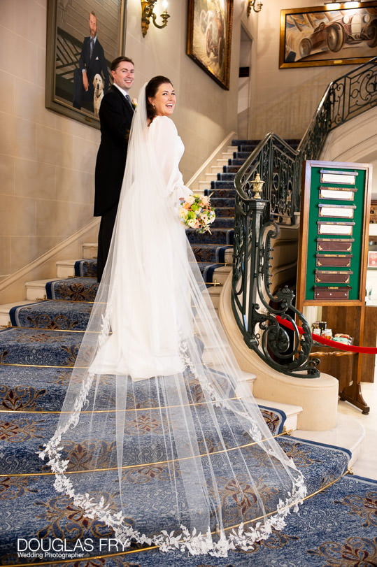 Wedding photographer at RAC in London - Mayfair - Royal Automobile Club - couple on the stairs