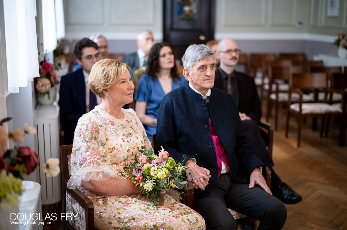 Chelsea Register Office photography by Douglas Fry of couple during ceremony.
