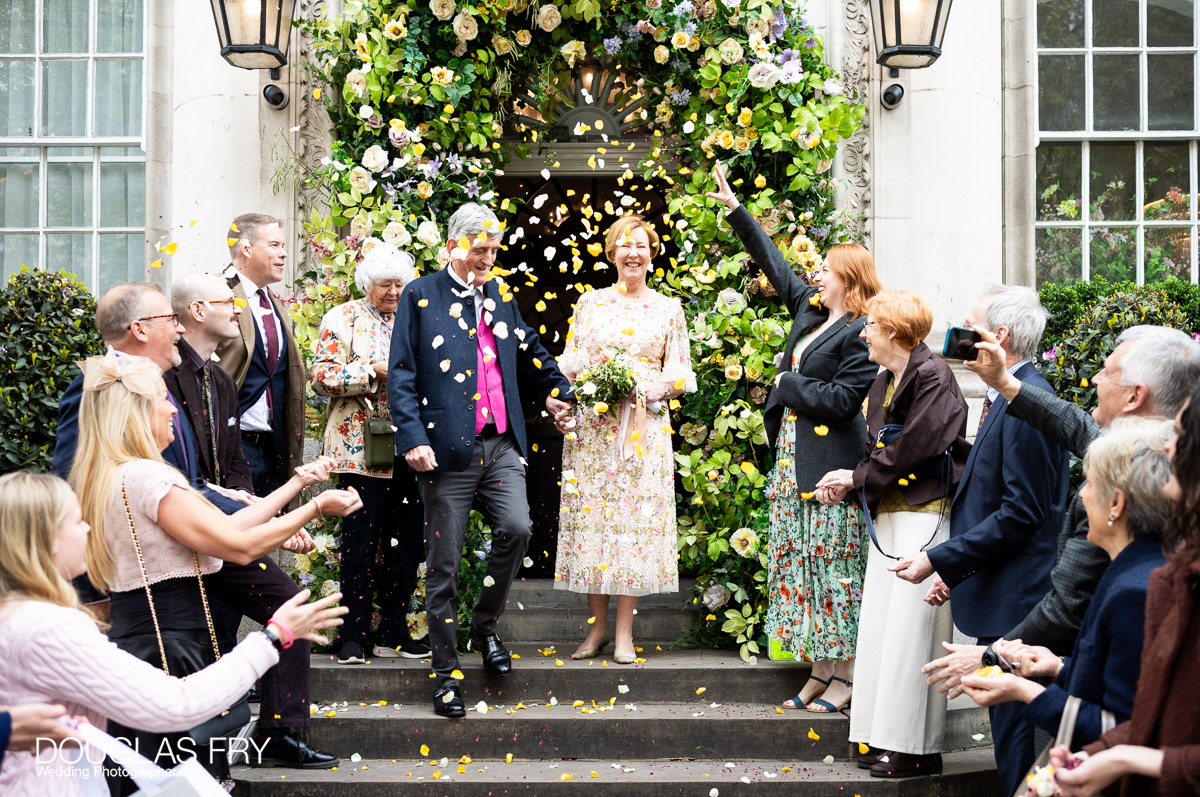 Wedding Photography at Chelsea Register Office and Then at London Home 1 Chelsea Register Office photography by Douglas Fry of couple and guests on steps out onto King's Road in London