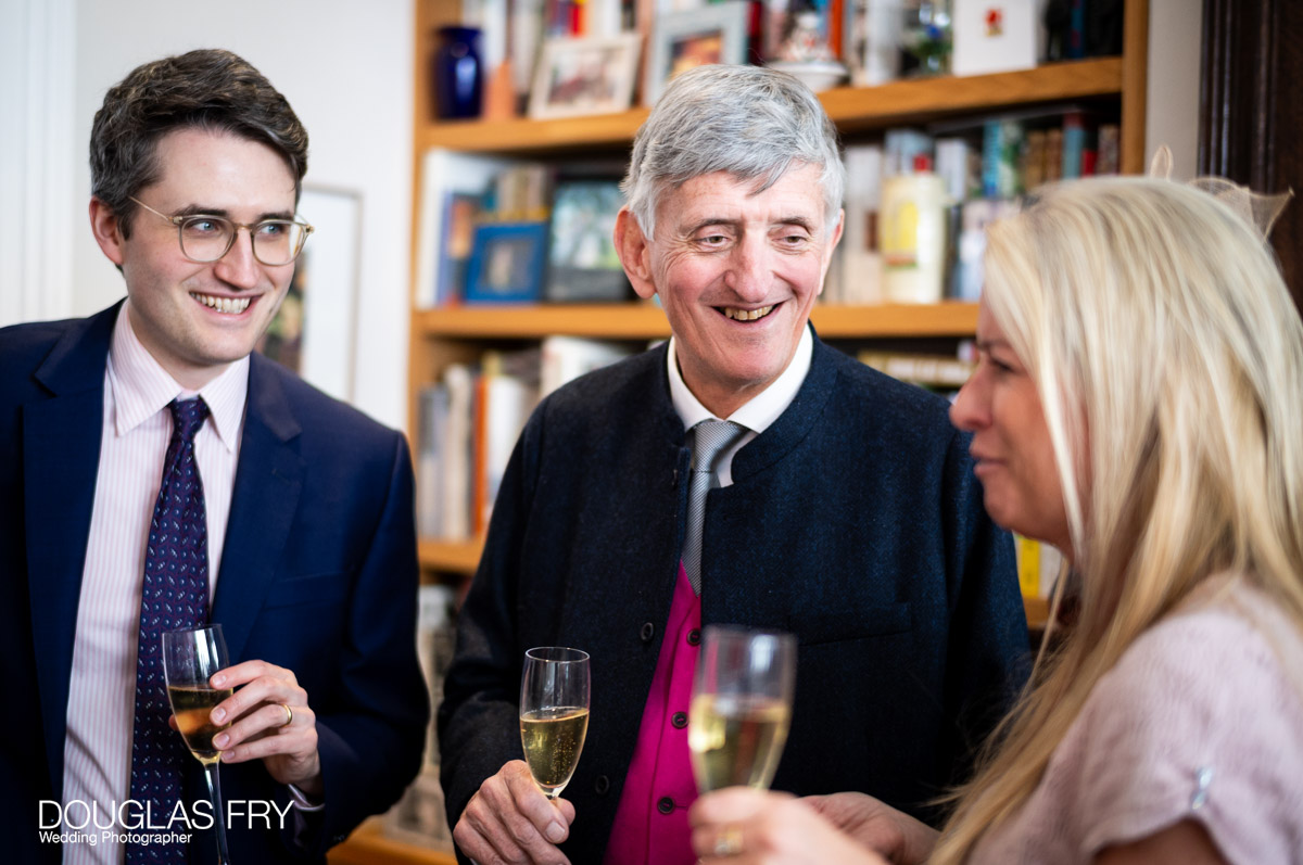 Wedding Photography at Chelsea Register Office and Then at London Home 12 Wedding photography by Douglas Fry of couple at home during reception.